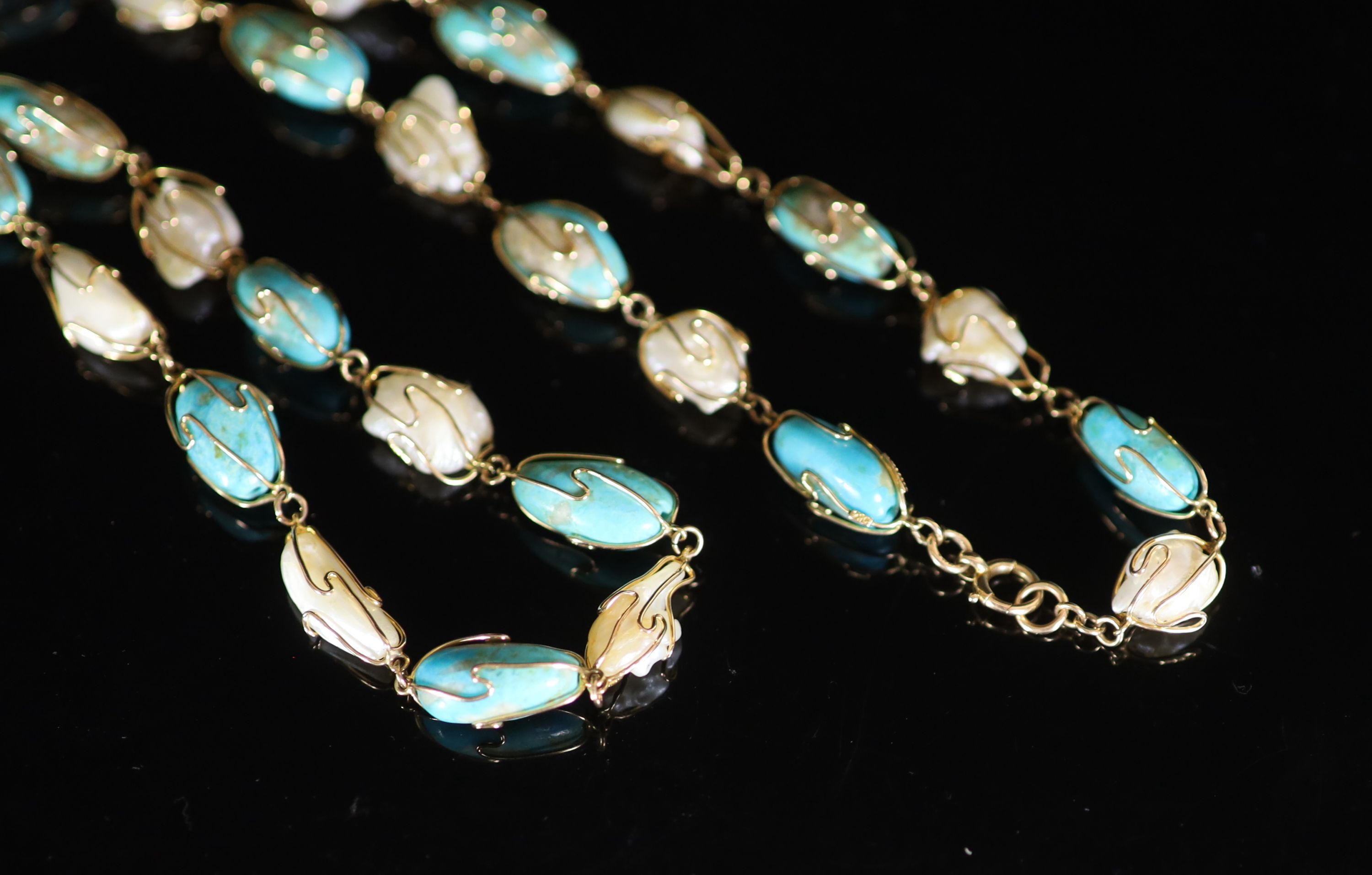 An early 20th century Liberty & Co? 15ct gold, baroque pearl and oval turquoise bead set necklace